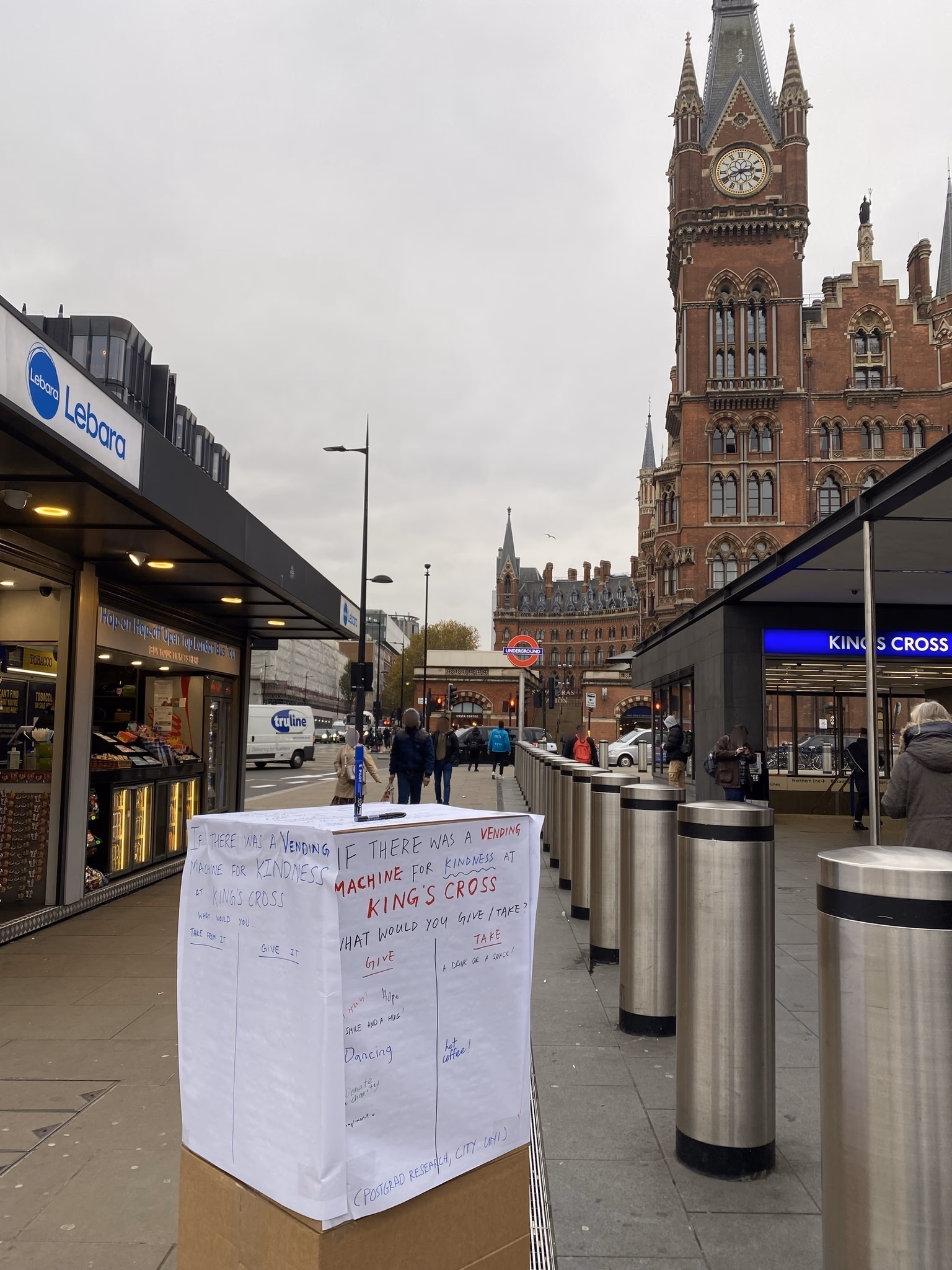 Cardboard vending machine prototype for the Kindness Box, placed at King's Cross